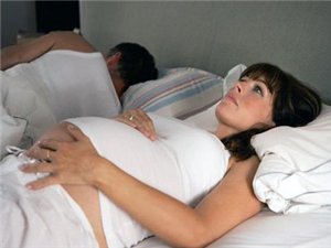 Боли в пояснице при беременности во втором триместре