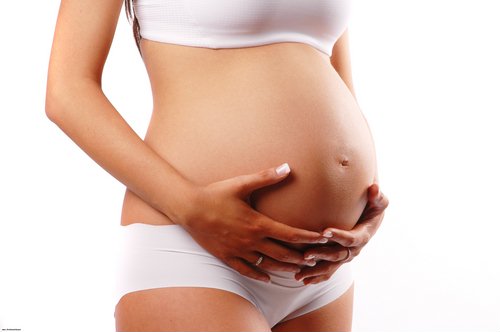 Боль в пояснице и месячные при беременности